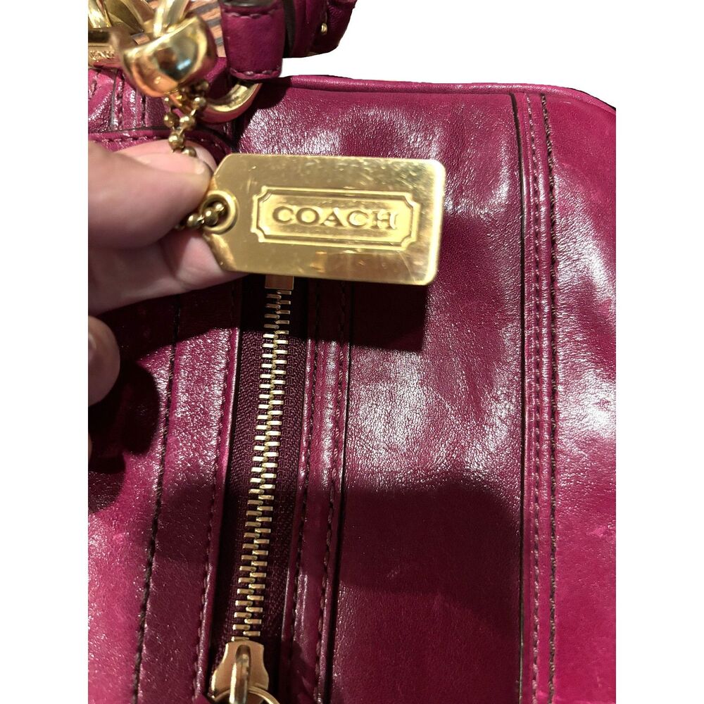 Coach, 6in x 11 in x1.25 inches Hampton Lindsey Magenta Leather Turn Lock Clutch - Picture 11 of 11